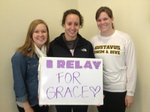 Members of the swim team Senior Amy Beck, Junior Brogan Barr and Sophomore Abby Hinrichs show their support for their teammate. Submitted