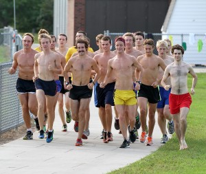 The men’s cross country team balances team bonding traditions and intensified training during the preseason. Gustavus Sports Information