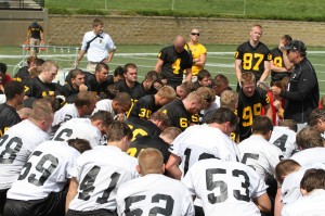 Head Coach Peter Haugen speaks with his team after practice. The team’s goal is to win the MIAC. Gustavus Sports Information