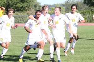 Captain Sean Sendlebach (#2) celebrated with his teammates after scoring the team’s only goal in Gustavus’ 1-0 victory over conference rival Concordia College. Gustavus Sports Information