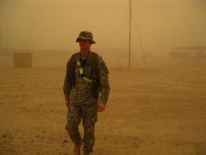 Specialist R. Eiler Henrickson walks from his living quarters to his battalion’s operations cell at C.O.B. Speicher, Iraq during a heavy sandstorm, known as a “haboob” in 2009. Submitted