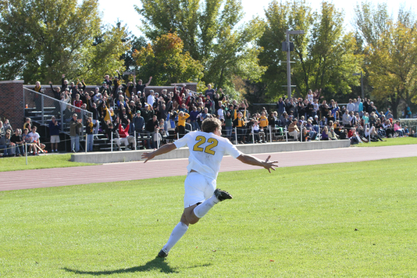 Zach Brown celebrating his game winner against the University of St. Thomas. Brown has been the Gusties’ top scorer for the past four years and is currently leading the team with 10 goals. 