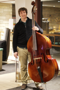 Michael began playing the double bass in 5th grade and now performs with many orchestras
