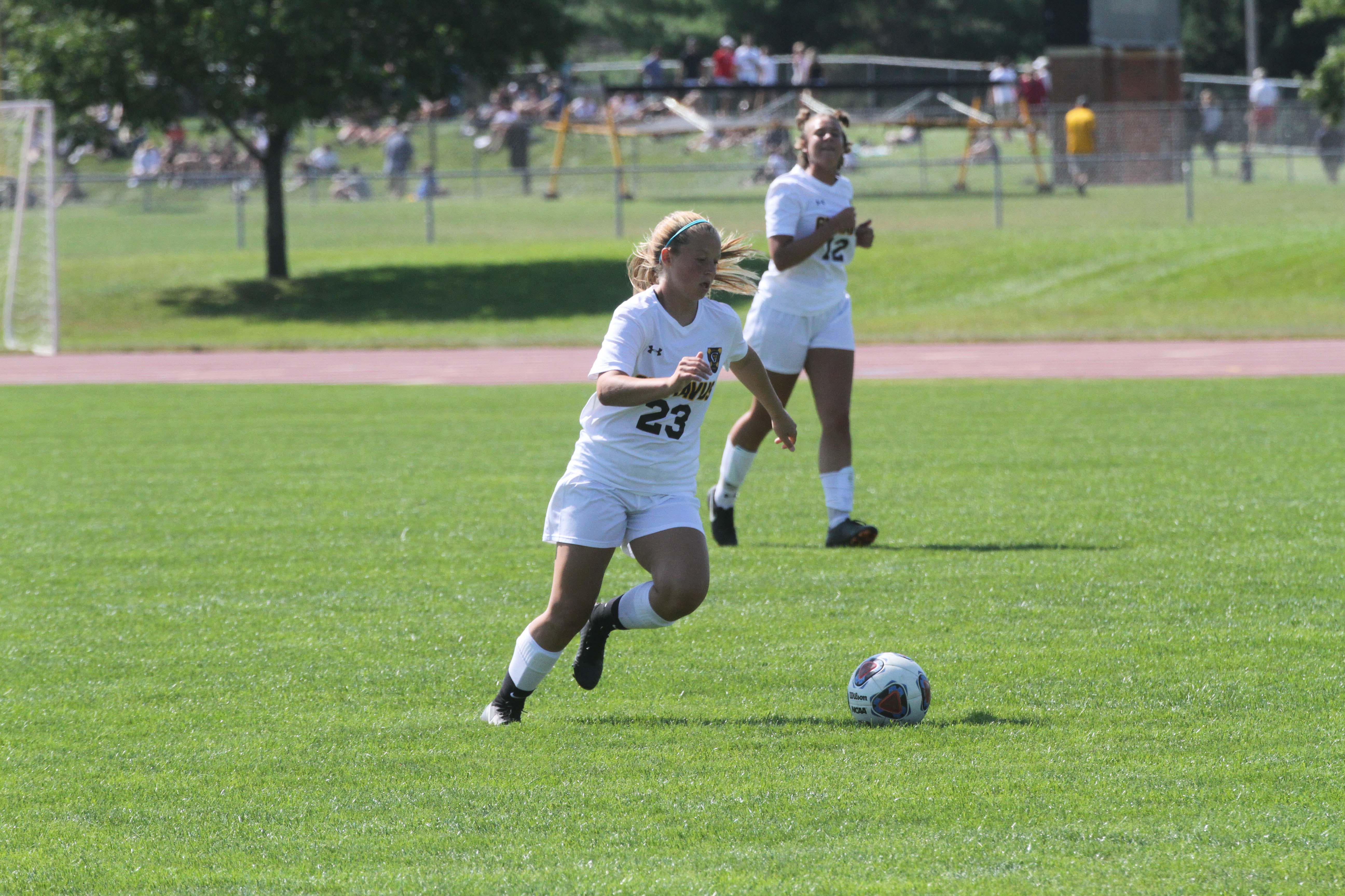 First-year Kenna West dribbles the ball up the field in a game against Nebraska Wesleyan. The Gusties currently hold an overall record of 4-4-1 and a record of 1-2-1 in the MIAC.