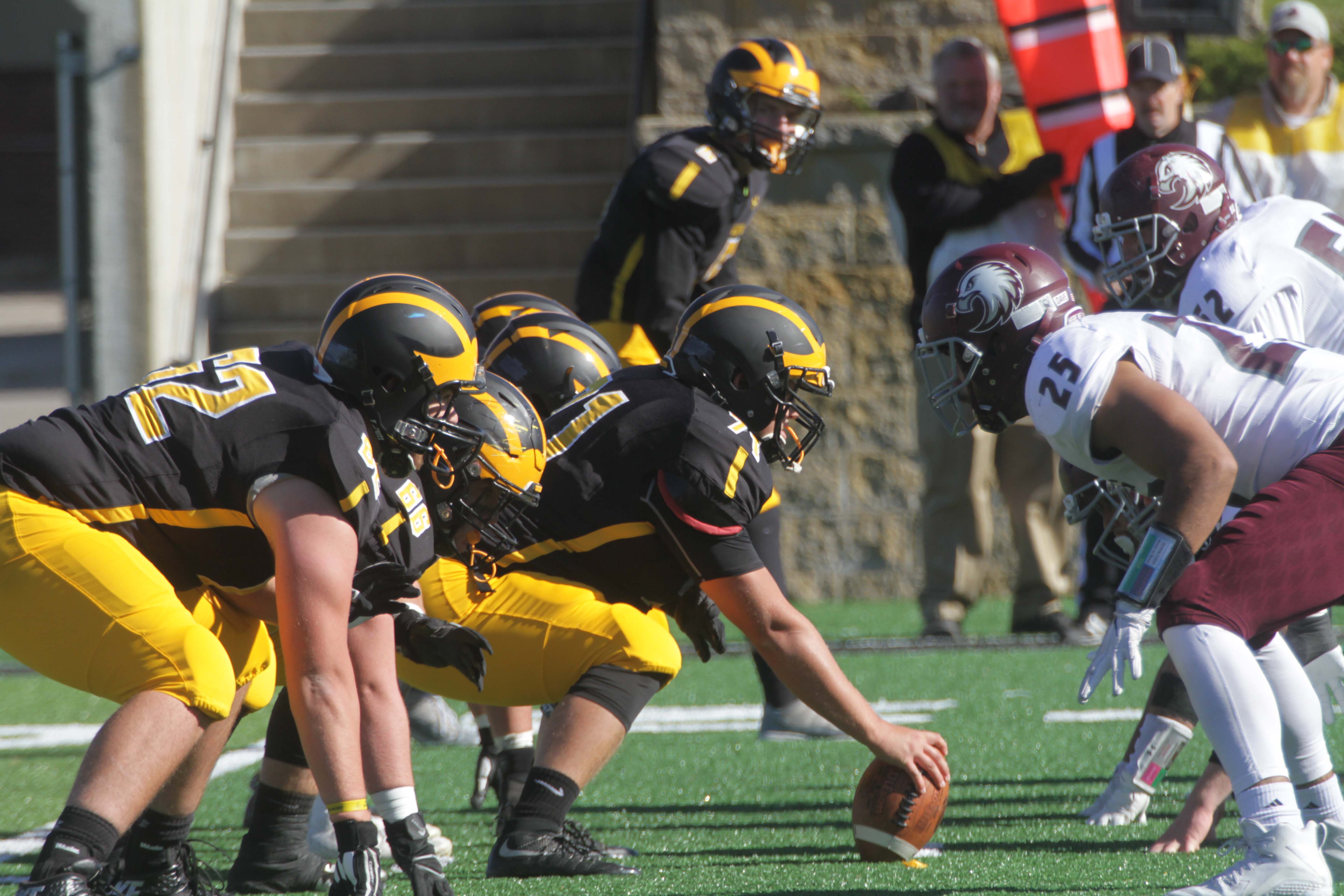 The Gustie offensive line sets up to snap the ball during a game against Augsburg. The team is currently on a four game winning streak heading into their game this Saturday against the Tommies.