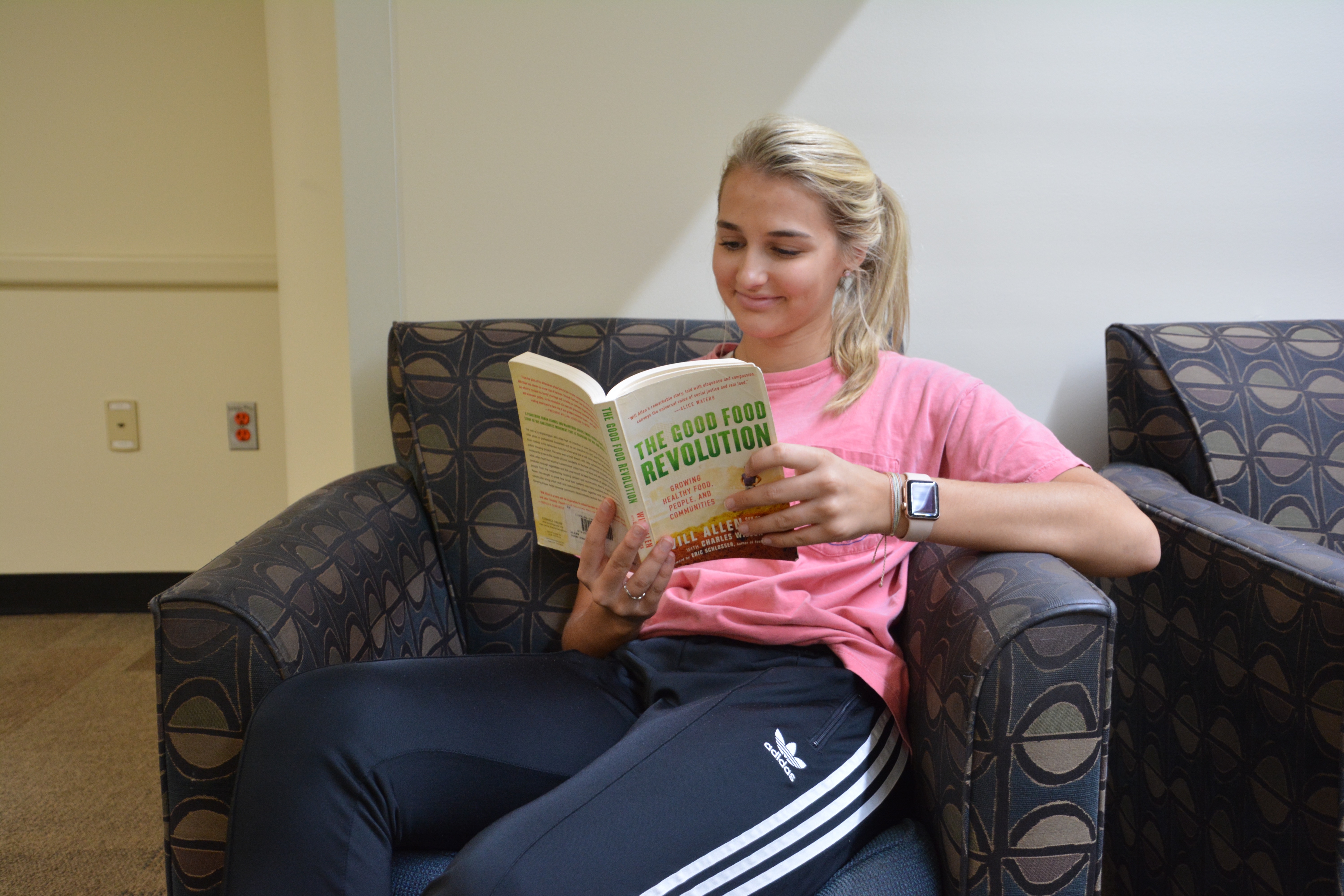 A first-year student spends her afternoon paging through her copy.