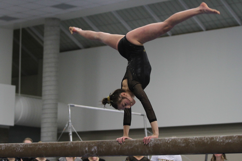 Senior Jamie Erdely competes on beam during Senior Night. The Gusties lost the competition against UW-La Crosse by a score of 185.550-183.800.