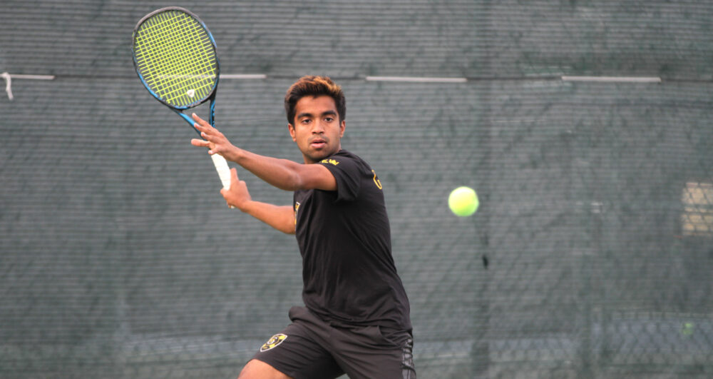 First-year Indraneel Raut returns a ball during a match at the fall ITA regionals.