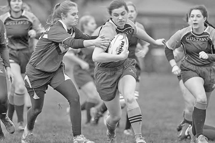 Quinn Bentz, a player on the Women’s Rugby team, makes a play down the rugby pitch.