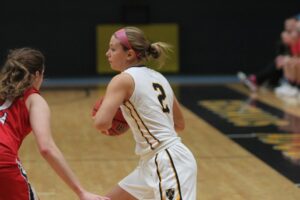 Junior Marnie Wagner looks for a pass during a game against Luther.
