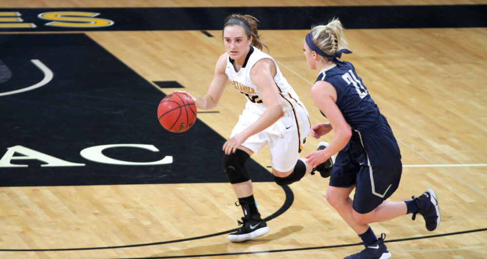 Junior Ava Gonsorowski dribbles the ball up the court for the Gusties. The team won its first two games of the season, defeating Luther and Bethany Lutheran.
