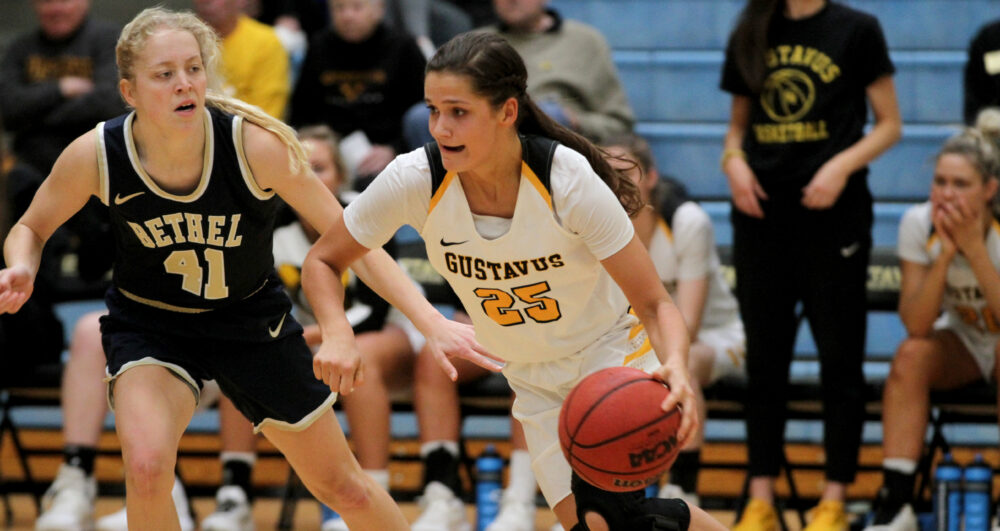 First-year Maddy Rice dribbles past a Bethel opponent during a game earlier this season. The Gusties recently defeated Hamline in the first round of playoffs and will move on to the semifinals.