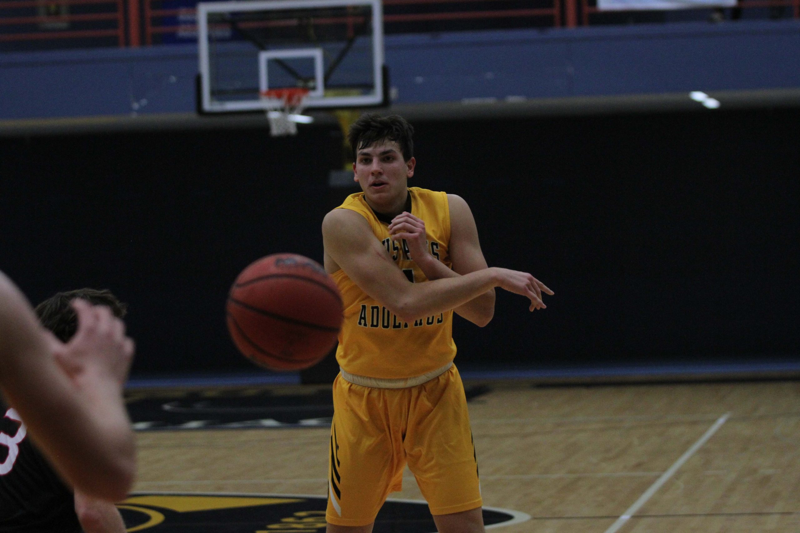 First-year Nolan Malo makes an inside pass during the season opener against Mayville State. The Gusties enter MIAC play against Hamline Nov. 28.