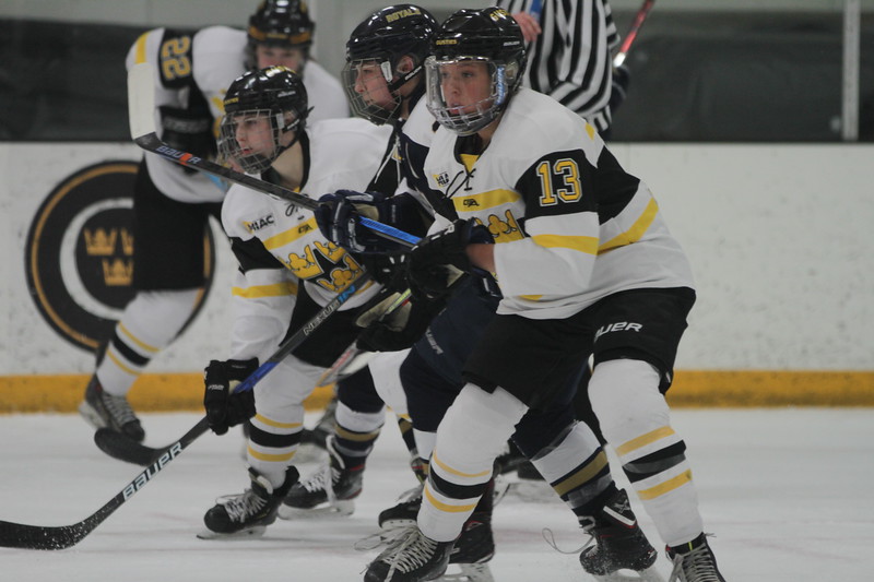 Sophomores Jordyn Peterson and Jamie Byrne fight for good positioning on a Bethel opponent. This past weekend, the team defeated the Royals 4-0 on Friday and 3-0 on Saturday to win the MIAC title and secure the No. 1 seed heading into postseason.